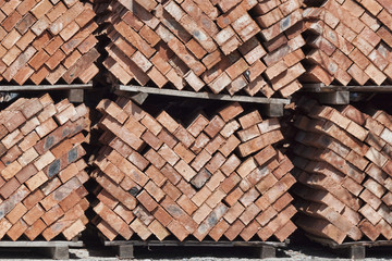 A pile of new red bricks