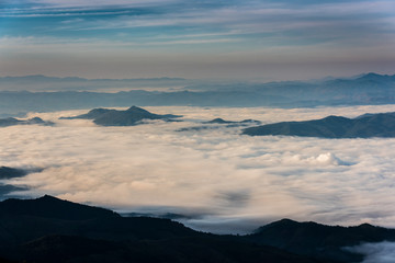 Obraz na płótnie Canvas The mountain is covered with fog