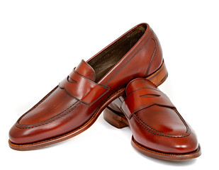 Pair of leather cherry calf penny loafer shoes together
