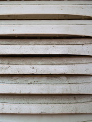 Dirty White Plastic Chairs Arranged