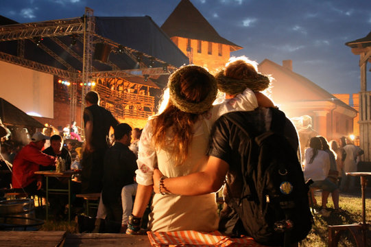 Young couple relaxing at a open-air music festival