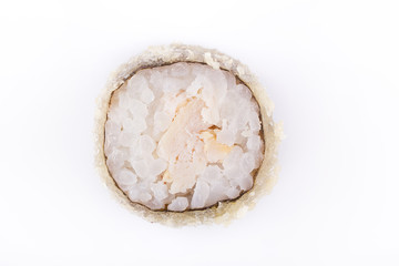 Roasted sushi roll with chicken. Japanese food. Hot roll with a crisp crusty on a white background.