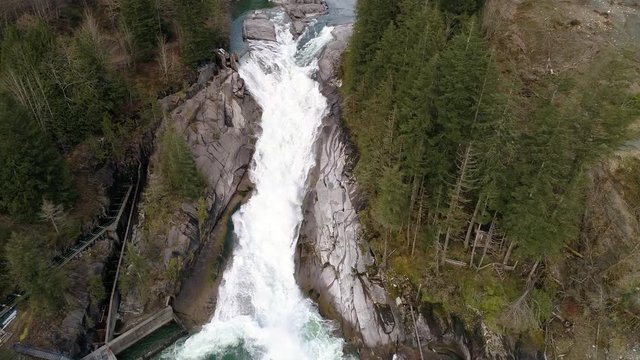 Helicopter Aerial View of Pacific Northwest Waterfall Sunset Falls in Washington State