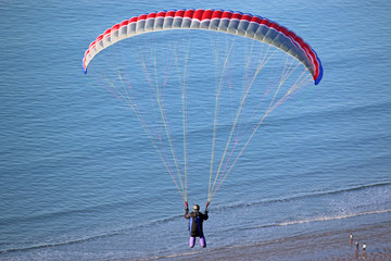 Paraglider above the sea