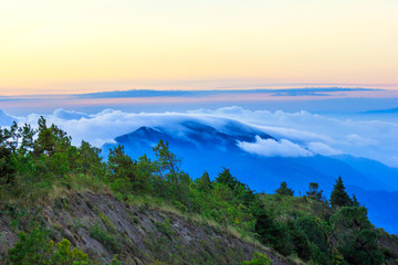 Beautiful Colorful Sunrise and Silhouette Mountain on the top of mountain in Thailand 
