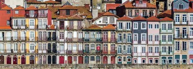 Fotobehang Tenement houses in Ribeira district of Porto, Portugal © Fotokon