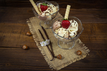Vanilla ice cream  with strawberry and chocolate in a bowl