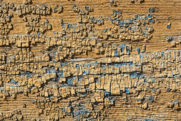Cracked painting on wooden surface