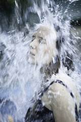 Girl splashing water 