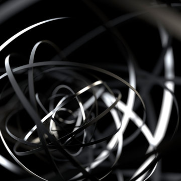 Abstract futuristic shape with metal rings on black background