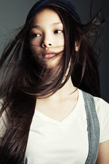 Fototapeta premium Portrait of a beautiful girl in hat 