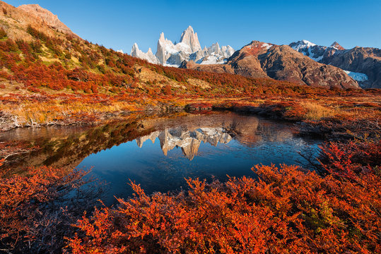 The autumn reflection of the Monte Fitz Roy (Cerro Chalte) - the peak located in Patagonia in the border area between Argentina and Chile, the view from the trail in the National Park of Los Glaciares - Powered by Adobe