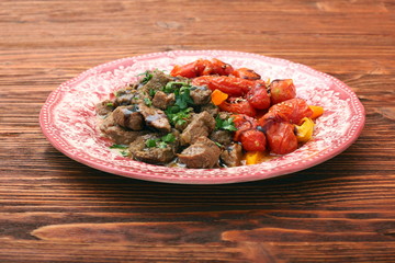 beef stew with peppers and cherry tomatoes