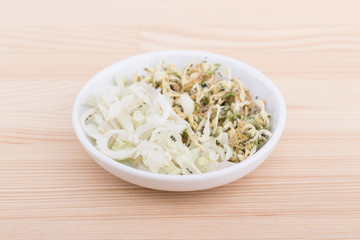  white archangel  / Bowl of fresh and dried white flowers of the deadnettle