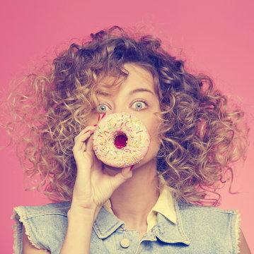 beautiful girl with a donut instead of a nose