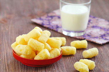 Sweet corn sticks with sugar powder and milk
