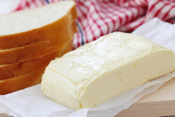 Fresh butter on the wooden table