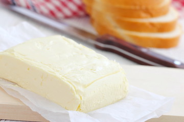 Fresh butter on the wooden table