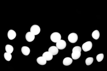 White Bokeh in black background