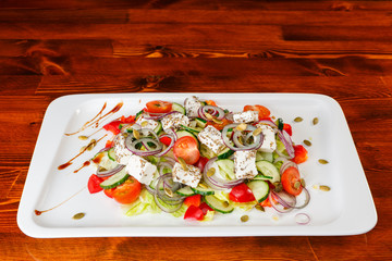 Greek salad with feta, cherry tomatoes, pepper and cucumber