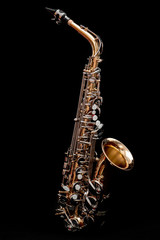 Obraz premium Saxophone isolated on black background