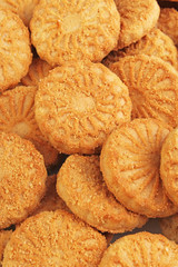  Biscuit sweet cookie craker background. Domestic stacked butter biscuit pattern concept. Biscuits texture close up macro. Food photo studio photography.