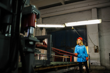 Fototapeta na wymiar woman in red safety helmet work as industrial worker