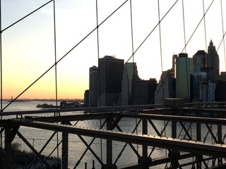 Manhattan skyline at sunset from Brooklyn Bridge