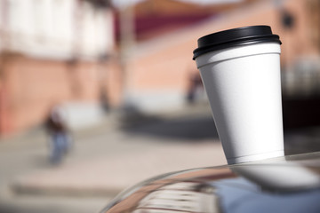 paper cup with coffee to go (space for logo)