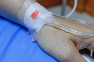 saline solution in a patients hand at hospital