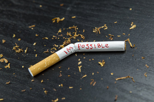 Broken cigarette on the table