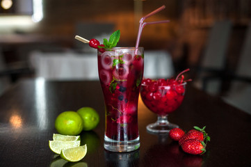 Selection of best selling drinks beer glass of wine cocktails martini mojito and shot short bar blurred background