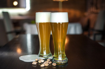 Selection of best selling drinks beer glass of wine cocktails martini mojito and shot short bar blurred background