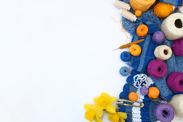 Fototapeta na wymiar Crocheting. Knitting and crochet tools
