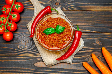 Spaghetti bolognese sauce in glass pot