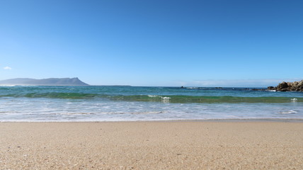 Rolling Waves on the Beach front in South Africa