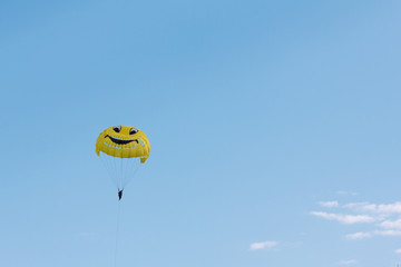 Parachuting over a sea, towing by boat