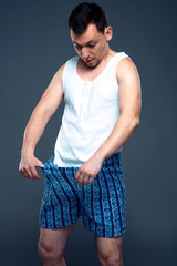 Man with pants down, prostate problem concept