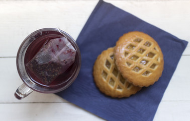 Apricot jam cookies on white table