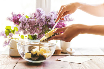 Step by step the chef prepares a dessert - chocolate fondant. Classic recipe.