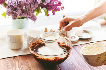 Step by step the chef prepares a dessert - chocolate fondant. Classic recipe.