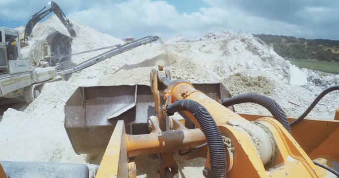 POV shot from a large construction loader working in a construction site