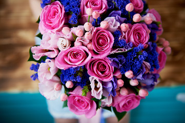 Wedding bouquet in pink and purple tones. Beautiful and delicate.