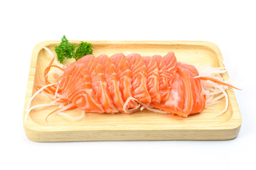 salmon sashimi on a wooden plate