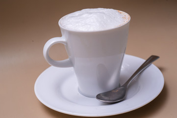 Coffee with Milk and spoon to the right 