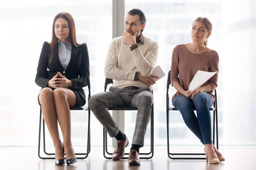 Three applicants making preparations for job interview, audition result awaiting, feeling worried...