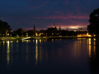 Beautiful and colorful sunset over Wroclaw. Reflection in the Odra River.