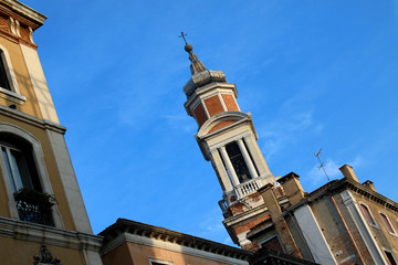 Fototapeta na wymiar Bell tower of a church in Venice, Italy.