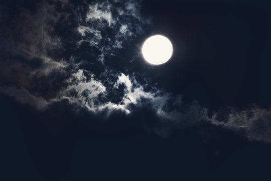 bright moon on the dark sky
