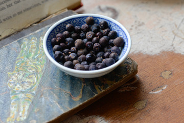 Bowl of Juniper Berries on Farm Table